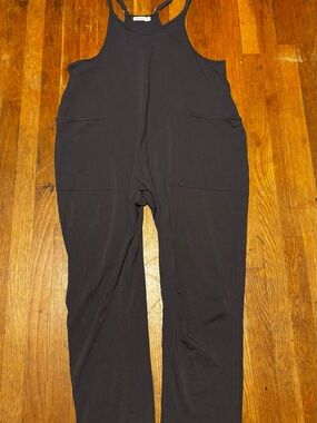 Oufeiya Women's Black Relaxed-Strap Jumpsuit with Front Pockets Size 8 Large
